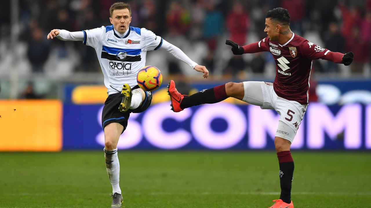 Da sinistra: Josip Ilicic dell'Atalanta e Armando Izzo del Torino, 23 febbraio 2019 (foto di Valerio Pennicino/Getty Images)